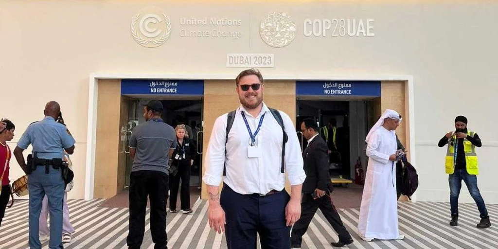 Pat at the entrance to COP28
